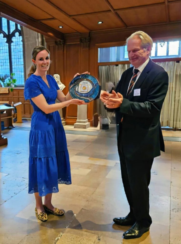 Image: Henry Tuck, Master of the Worshipful Company of Tobacco Pipe Makers and Tobacco Blenders, presenting the award to Physics Partners CEO, Sally Smith.